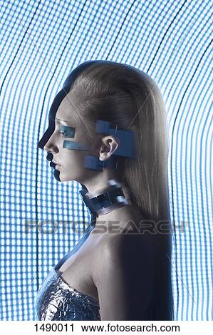 Stock Image - Side view of confident fashion model. Fotosearch