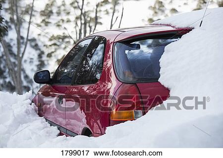 Stock Photo - Snow covering parked car. Fotosearch