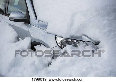 Stock Photo - Snow covering parked car. Fotosearch