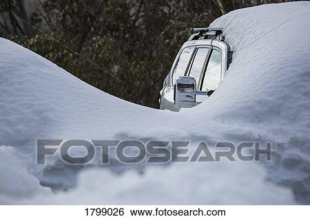 Snow covering parked car View Large Photo Image Stock Photograph - Snow covering parked car. Fotosearch