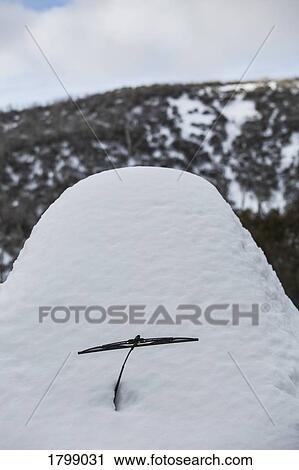 Snow mound covering car View Large Photo Image Stock Image - Snow mound covering car. Fotosearch