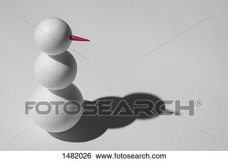Snowman and its shadow over white background View Large Photo Image Stock Photograph - Snowman and its shadow over white background. Fotosearch