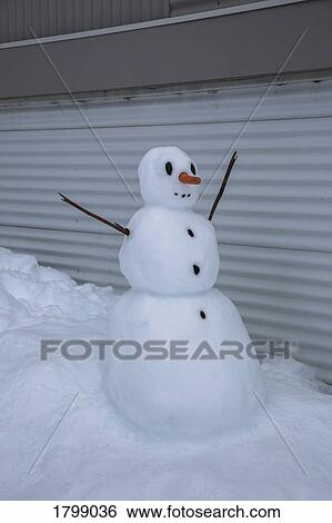 Snowman in driveway View Large Photo Image Stock Photograph - Snowman in driveway. Fotosearch