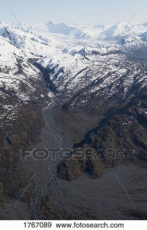 Snowy mountains and Colony Glacier, Knik Valley, Anchorage, Alaska, USA View Large Photo Image Stock Photo - Snowy mountains and Colony Glacier, Knik Valley, Anchorage, Alaska, USA. Fotosearch