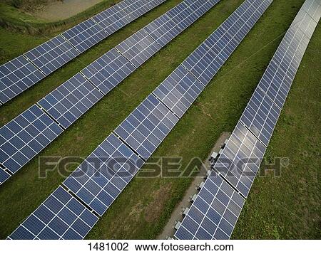 Solar panels on field View Large Photo Image Stock Image - Solar panels on field. Fotosearch