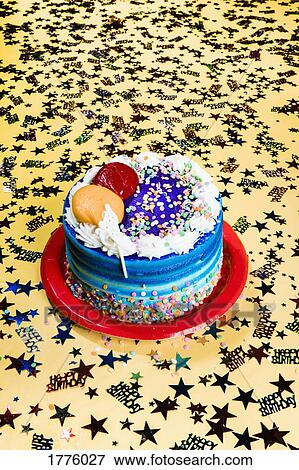 Still life birthday cake and star confetti View Large Photo Image Stock Photo - Still life birthday cake and star confetti. Fotosearch