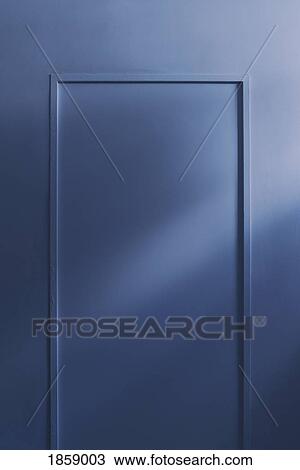 Sunlight over hidden blue door View Large Photo Image Stock Image - Sunlight over hidden blue door. Fotosearch