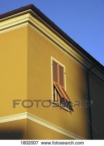 Sunlight shining on yellow building with shutters, Lerici, Liguria, Italy View Large Photo Image Stock Photo - Sunlight shining on yellow building with shutters, Lerici, Liguria, Italy. Fotosearch