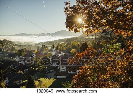 Sunny, idyllic scenic autumn view of townscape, Bad Kohlgrub, Bayern, Germany View Large Photo Image Stock Photo - Sunny, idyllic scenic autumn view of townscape, Bad Kohlgrub, Bayern, Germany. Fotosearch
