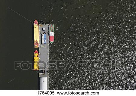 View from above ships moored at commercial dock View Large Photo Image Stock Photography - View from above ships moored at commercial dock. Fotosearch