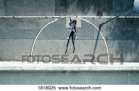 View from above young man with afro hanging from urban curb View Large Photo Image Stock Photography - View from above young man with afro hanging from urban curb. Fotosearch