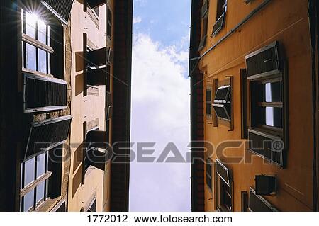Stock Image - View from below apartment buildings, Florence, Tuscany, Italy. Fotosearch