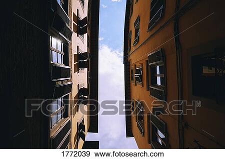 Stock Photo - View from below apartment buildings, Florence, Tuscany, Italy. Fotosearch