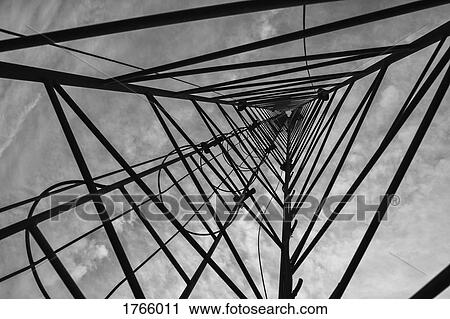 Stock Image - View from below triangular communications tower. Fotosearch