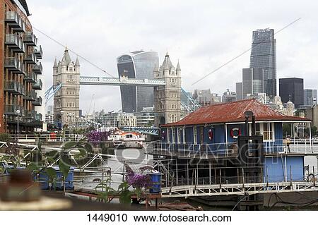 View of Tower Bridge and modern buildings, London, England, United Kingdom View Large Photo Image Stock Image - View of Tower Bridge and modern buildings, London, England, United Kingdom. Fotosearch