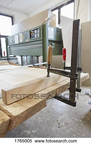 Vise grip clamping wood in carpentry workshop View Large Photo Image Stock Photography - Vise grip clamping wood in carpentry workshop. Fotosearch