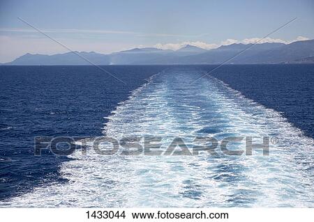 Wake in sea against sky View Large Photo Image Picture - Wake in sea against sky. Fotosearch
