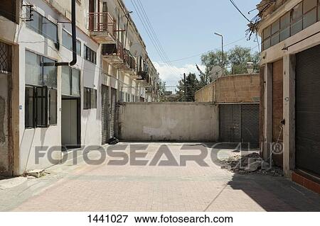 Wall dividing street and buildings, Nicosia, Cyprus View Large Photo Image Stock Photo - Wall dividing street and buildings, Nicosia, Cyprus. Fotosearch