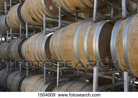 Wine barrels in shelves at cellar View Large Photo Image Stock Photo - Wine barrels in shelves at cellar. Fotosearch