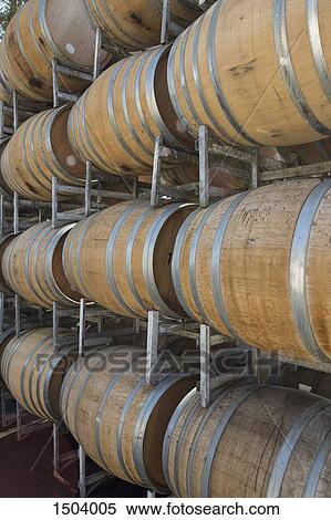 Wine barrels in shelves at cellar View Large Photo Image Stock Photography - Wine barrels in shelves at cellar. Fotosearch