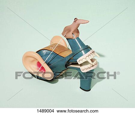 Witch made from high heels over colored background View Large Photo Image Picture - Witch made from high heels over colored background. Fotosearch