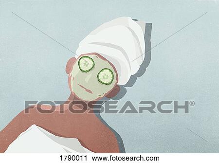 Women with face mask, cucumber on eyes and hair wrapped in towel View Large Photo Image Stock Image - Women with face mask, cucumber on eyes and hair wrapped in towel. Fotosearch