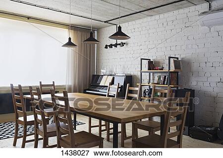 Wooden dining table and chairs at home View Large Photo Image Stock Photo - Wooden dining table and chairs at home. Fotosearch