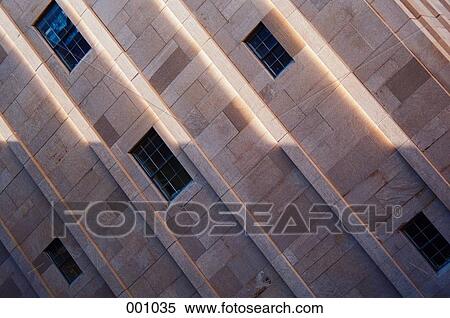 a sideways perspective of a building with windows View Large Photo Image Stock Photography - a sideways perspective of a building with windows. Fotosearch