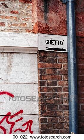 a sign with arrow pointing to the ghetto View Large Photo Image Stock Image - a sign with arrow pointing to the ghetto. Fotosearch