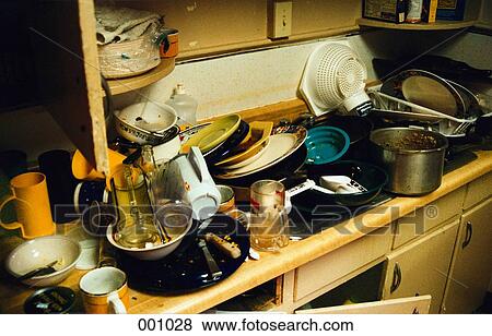 Stock Photo - dirty dishes piled in a sink. Fotosearch