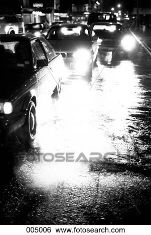 Stock Photograph - Traffic on a New York city street at night. Fotosearch