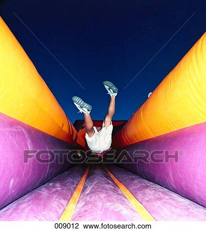 boy jumping on trampoline View Large Photo Image Stock Image - boy jumping on trampoline. Fotosearch