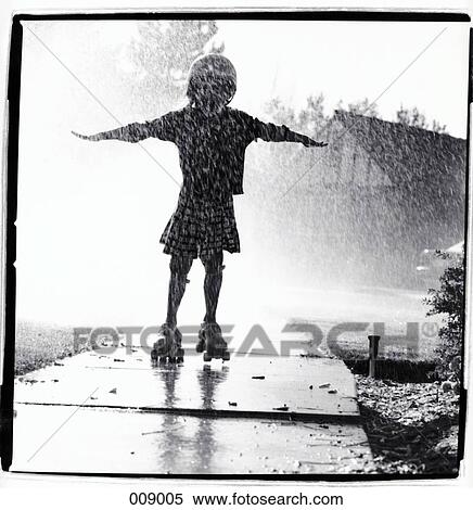 girl skating in rain View Large Photo Image Stock Photography - girl skating in rain. Fotosearch