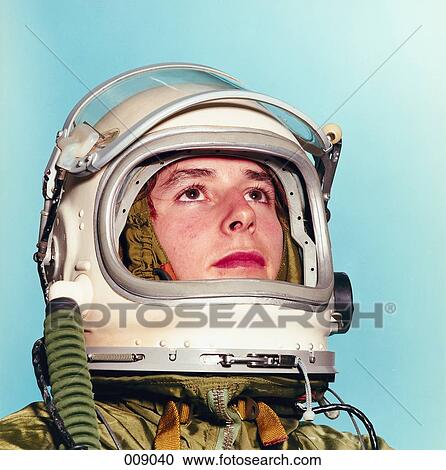 Stock Image - young man posing as an astronaut. Fotosearch