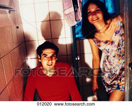man and woman together in a bathroom View Large Photo Image Stock Image - man and woman together in a bathroom. Fotosearch
