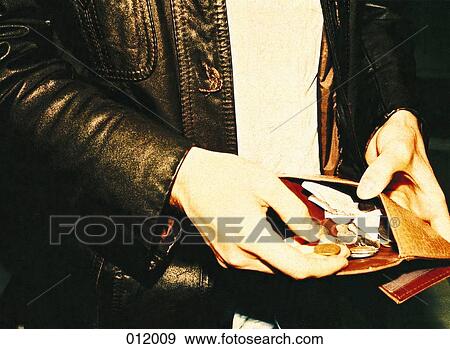 man counting change View Large Photo Image Stock Photo - man counting change. Fotosearch