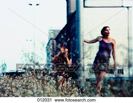 two women outside View Large Photo Image Stock Image - two women outside. Fotosearch