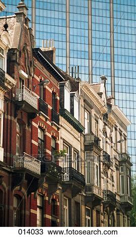old row of buildings with modern skyscraper in the background View Large Photo Image Stock Image - old row of buildings with modern skyscraper in the background. Fotosearch