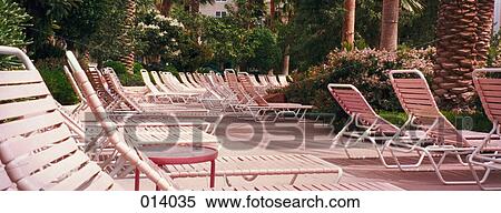 Stock Photography - row of pink lounge chairs . Fotosearch