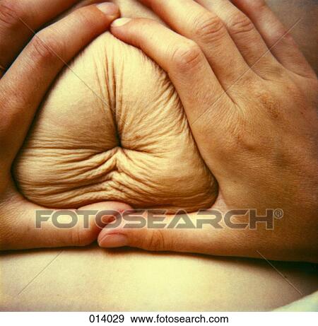 scrunched up belly button View Large Photo Image Stock Photo - scrunched up belly button. Fotosearch