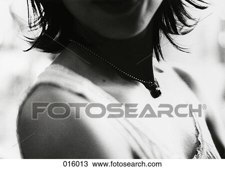 Stock Image - chin, neck, and chest of a woman. Fotosearch