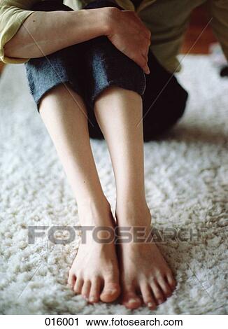 feet of person on white carpet View Large Photo Image Stock Image - feet of person on white carpet. Fotosearch