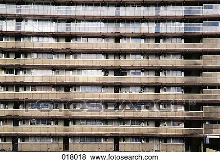 a grey apartment building View Large Photo Image Stock Photo - a grey apartment building. Fotosearch