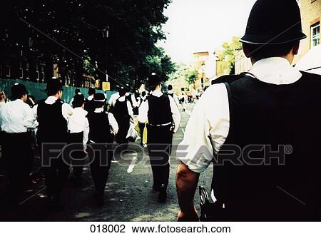 group of police walking through the street View Large Photo Image Stock Image - group of police walking through the street. Fotosearch