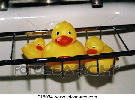 three rubber ducks on a soap dish View Large Photo Image Picture - three rubber ducks on a soap dish. Fotosearch