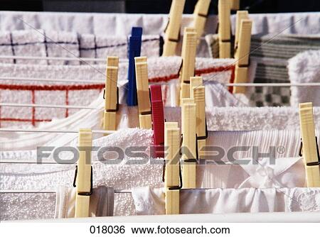 towels hanging on a clothes line View Large Photo Image Stock Photograph - towels hanging on a clothes line. Fotosearch