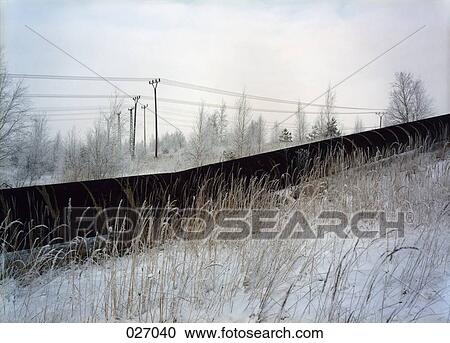 A snow-covered landscape View Large Photo Image Stock Image - A snow-covered landscape. Fotosearch