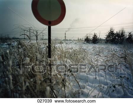 A street sign in a snow-covered field View Large Photo Image Stock Photo - A street sign in a snow-covered field. Fotosearch