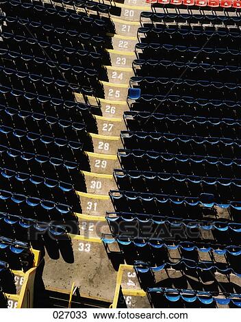 Rows of seats in a stadium View Large Photo Image Stock Image - Rows of seats in a stadium. Fotosearch