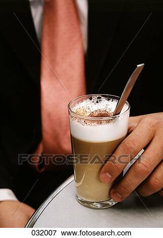 A businessman with coffee View Large Photo Image Stock Photo - A businessman with coffee. Fotosearch